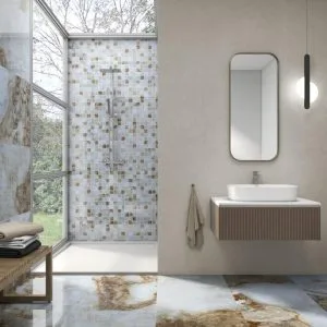 Mallas - Bathroom with white marble look and graphic decor on floor and wall, Pamesa