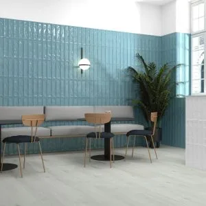 Origin Mayolica - Cafe and hospitality with turquoise glazed colored tile on wall, Pamesa