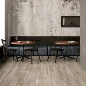 CR. Rovere - Restaurant and hospitality with light wood look and grey concrete look on floor and wall, Pamesa