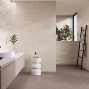Dosso - Bathroom with beige stone look and grey concrete look on wall and floor, Pamesa