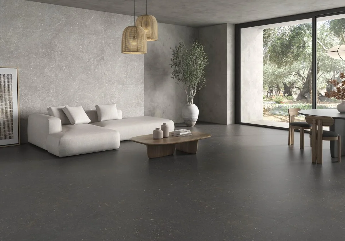 Dover - Living room with grey concrete look on floor and wall, Pamesa