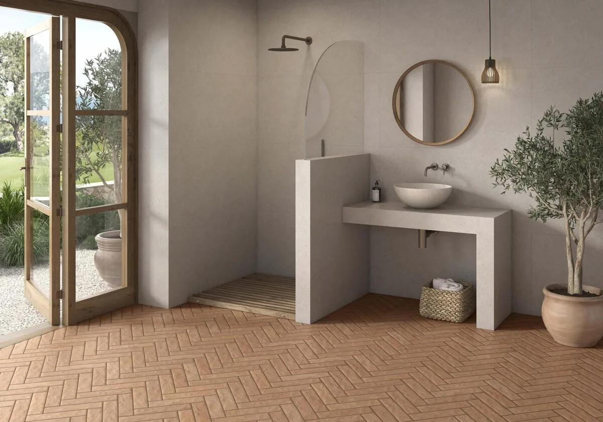 Nature - Bathroom with terracotta herringbone tile and light concrete look on floor and wall, Pamesa